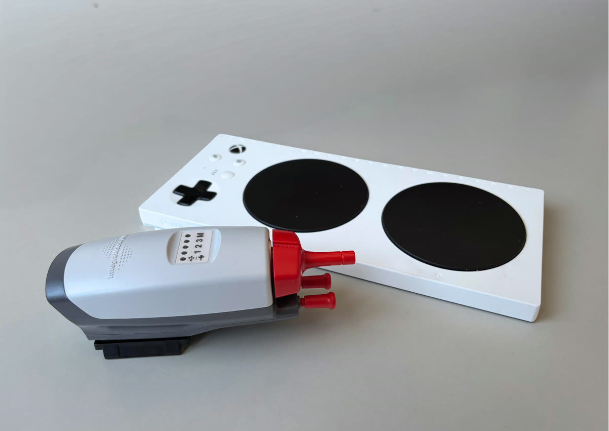 IntegraMouse AIR next to the Xbox Adaptive Controller
